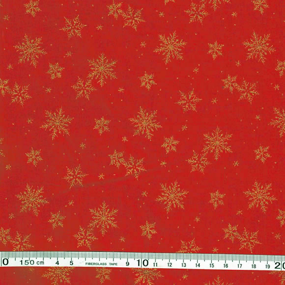 送料無料　クリスマス生地（布）雪の結晶柄(金） 赤地 1m 単位　パッチワーク コットン100％　ディスプレー