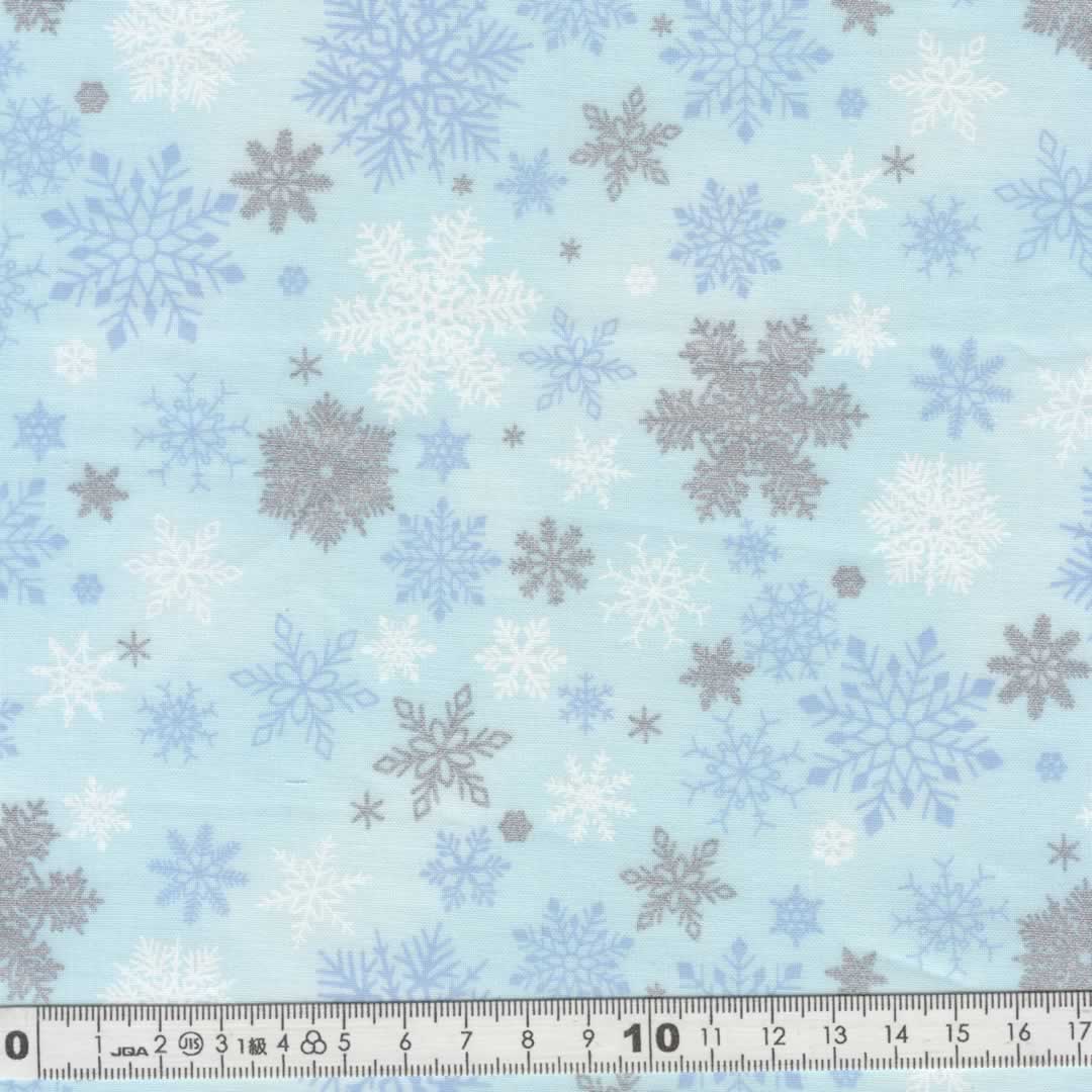 送料無料  クリスマス生地（布）スノーフレーク結晶柄 サックス  1m単位　パッチワーク コットン100％　ディスプレー